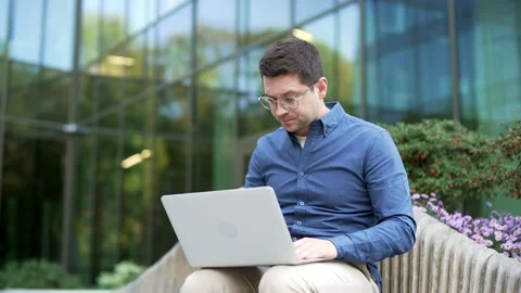 Worried businessman having problems with software or service on laptop computer  Stock Footage 307491967