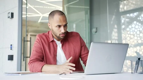 Worried businessman having problems with software or service on laptop computer  Stock Footage 311621267