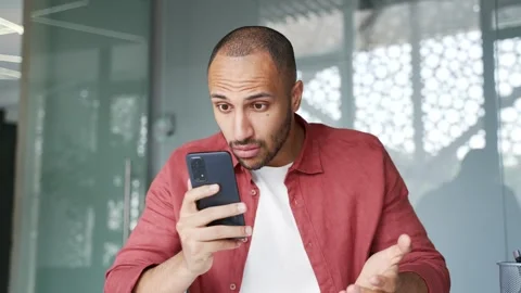 Worried businessman having problems with software or service on smartphone  Stock Footage 311622643