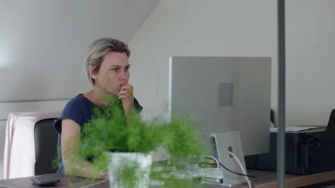 Worried female looking computer reading bad news start typing keyboard chatting Stock Footage 207702929