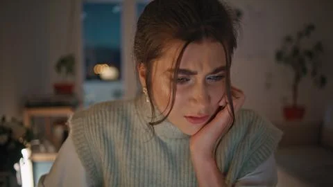 Worried freelancer finding mistake late apartment closeup. Lady looking computer Stock Photos