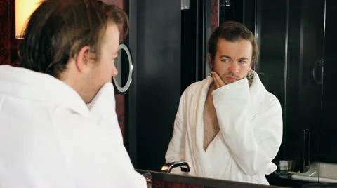 Worried in front of mirror - HD Stock Footage 12235250