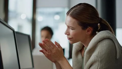 Worried it manager analyze software code closeup. Exhausted woman rubbing head Stock Photos