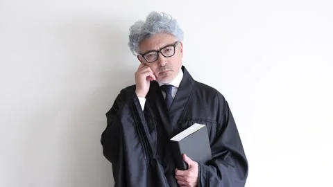 Worried Judge Thinking Carefully About a Difficult Court Decision Vídeos de archivo 343947710