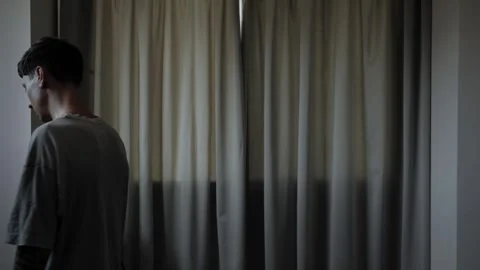 Worried man pacing at home while overthinking difficult problem Stock Footage 346606690