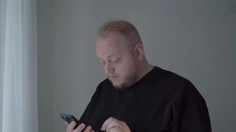 Worried Man Reading Locked Online Account Alert on Smartphone Stock Footage 342053155