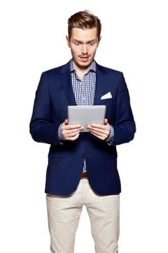 Worried man using digital tablet Stock Photos