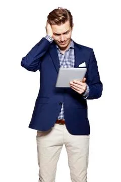 Worried man using digital tablet Stock Photos