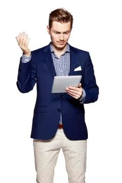 Worried man using digital tablet Stock Photos