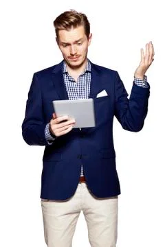 Worried man using digital tablet Foto stock