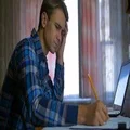The worried man work with a paper. Real time capture 4k or 4k+ Resolution