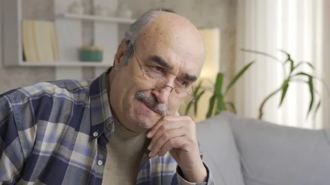 Worried Old Man Lost in Thoughts. Loneliness and retirement. Stock Footage 225623386