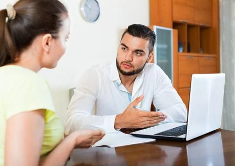 Worried pair having problems with contract Stock Photos