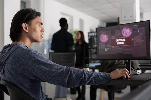 Worried software developer having web server hacked 写真素材