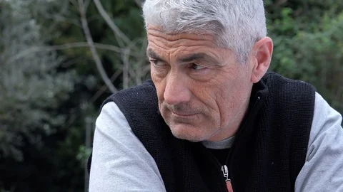 Worried thoughtful mid aged man standing pensive and perplexed Stock-Footage 74684124