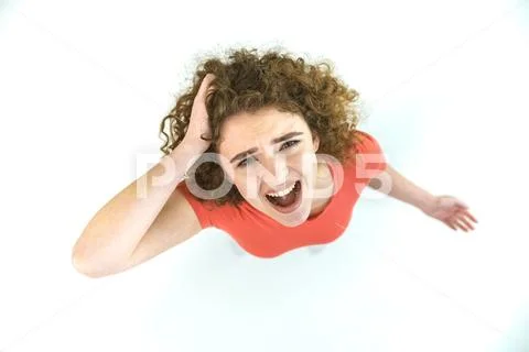 The worried woman cry on the white background. View from above Stock Photos