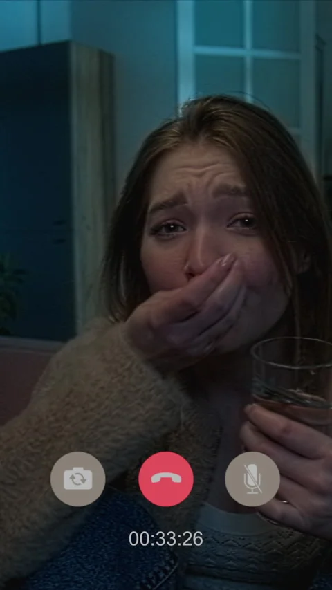 Worried Woman Taking Pills while Video Calling Alone in Apartment Stock-Footage 311566853