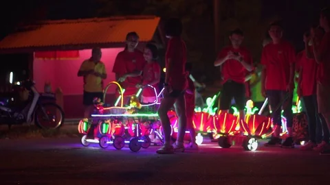 Worshipper Getting Ready For Their LED Lantern During Nine Emperor Gods Birthday Stock Footage 85410158