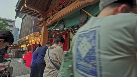 Worshippers Queue at Iriya Temple's Gilded Altar Entrance, Tokyo Stock Footage 344006254
