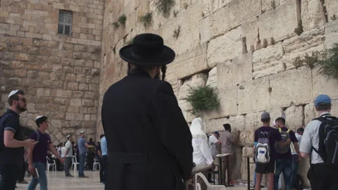 Worshippers at the wailing Wall in Jerusalem, Jerusalem, Israel - 5 may 2021 Stock Footage 168954832
