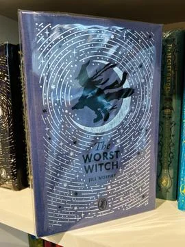 The Worst Witch by Jill Murphy blue moon circle cover with witch silhouette Stock Photos