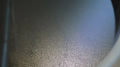 Wort mashing and boiling machine at work. Stirrer mixes malt Video stock 149662759