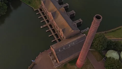 Wouda pumping station drone flyover at sunrise Stockbeeldmateriaal 341876148