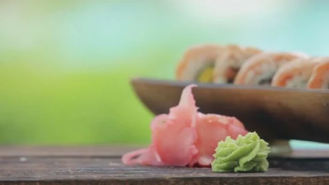 That would be tasty rolls. Selective focus on ready tasty sushi rolls 動画素材 75905504