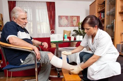 Wound care by nurses Stock Photos