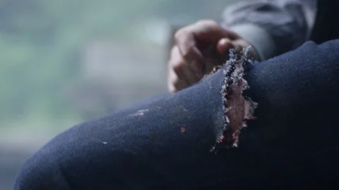 Wounded in the leg man Stock Footage 113445148