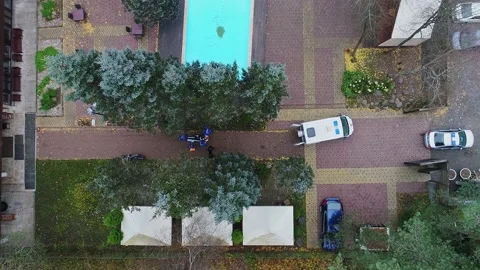 A wounded man is loaded into an ambulance 動画素材 146221982