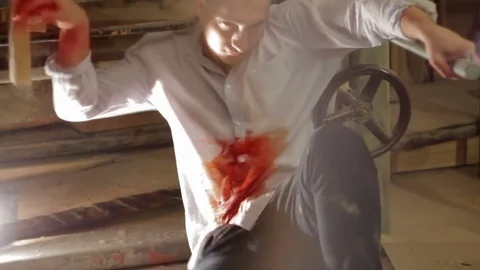 Wounded in the stomach man Stock Footage 71546002