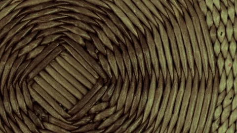 Woven basket creating process in a artisan workshop with intricate designs and Stock Footage 321664631