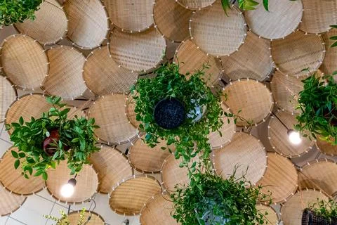 Woven circular panels form a textured wall Stock Photos