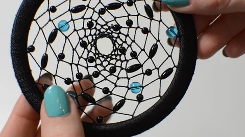Woven dreamcatcher with feathers Stock Footage 87742344