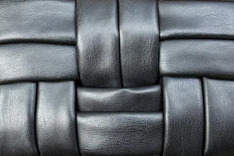 Woven leather strips pattern, soft focus Stock Photos
