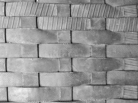 Woven pattern created using strips of rubber, likely repurposed tire material Stock Photos