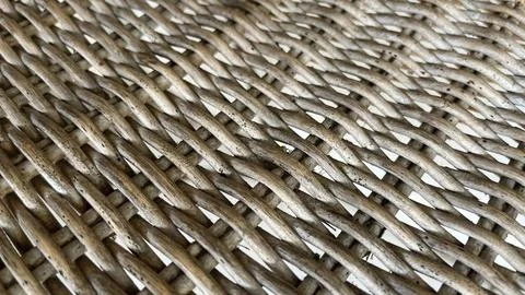 Woven strands form a tight, repeating pattern. Stock Photos