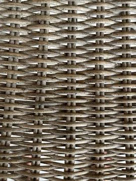 Woven strands form a tight, repeating pattern. Stock Photos