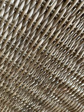 Woven strands form a tight, repeating pattern. Stock Photos