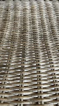 Woven strands form a tight, repeating pattern. Stock Photos