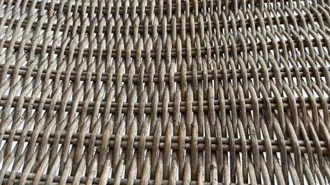 Woven strands form a tight, repeating pattern. Stock Photos