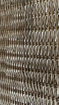 Woven strands form a tight, repeating pattern. Stock Photos