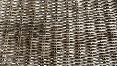 Woven strands form a tight, repeating pattern. Stock Photos