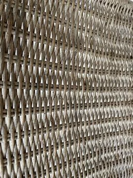 Woven strands form a tight, repeating pattern. Stock Photos