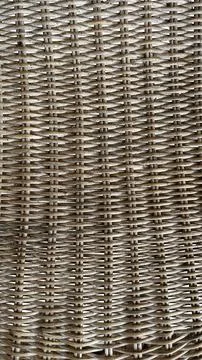 Woven strands form a tight, repeating pattern. Stock Photos