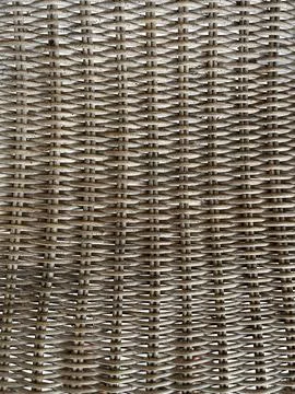 Woven strands form a tight, repeating pattern. Stock Photos