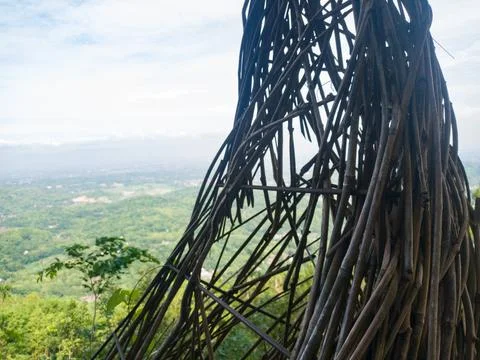 Woven structure overlooking distant landscape Stock Photos
