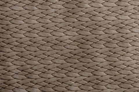Woven textile texture showing a complex pattern in neutral colors suitable .. Stock Photos