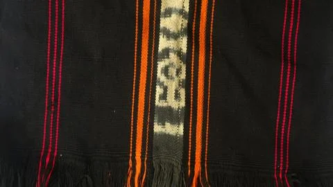 Woven textile with unique pattern from Indonesia, textured fabric background Stock Photos